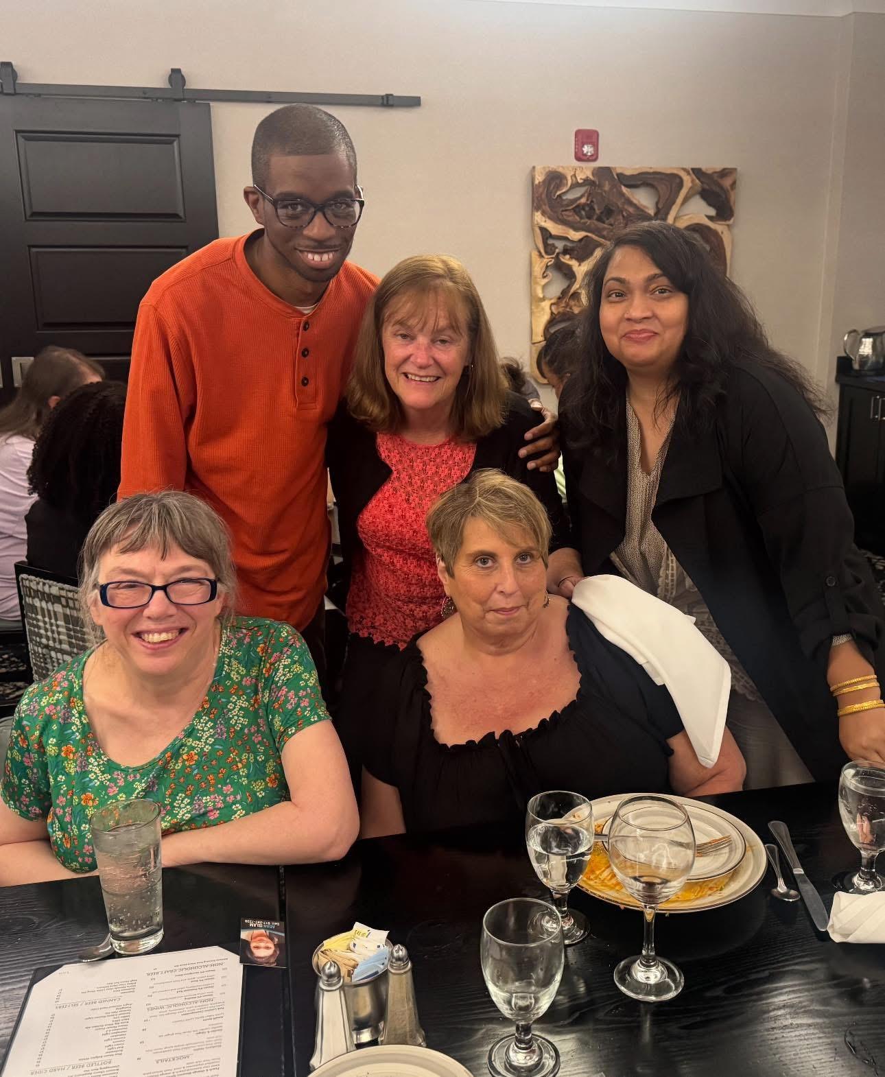 Adan Islam at a community dinner